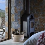 Double room with wood burner at romantic Country Hotel Velani