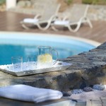 Relaxing at the swimming pool at country Hotel Velani in Greece crete