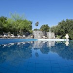Swimming pool with spacious sun deck at Country Hotel Velani in Greece Crete