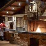 Greek Restaurant Velani cooks in atraditional oven the local healthy Cretan diet or Greek cuisine.